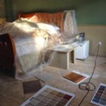 Guest room being remodeled after water damage