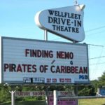 Wellfleet Drive-In Theatere sign that reads: Finding Nemo, G and Pirates of the Caribbean, PG13