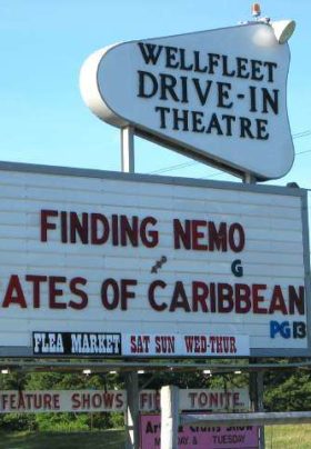 Wellfleet Drive-In Theatere sign that reads: Finding Nemo, G and Pirates of the Caribbean, PG13