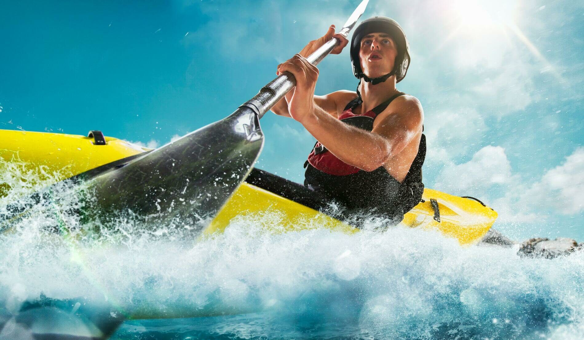 A man paddling in a kayak