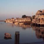 View over the water with buildings, piers, and boats